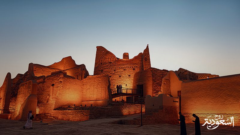 Ancient buildings in Diriyah. text in the corner: "Saudi. Welcome to Arabia"