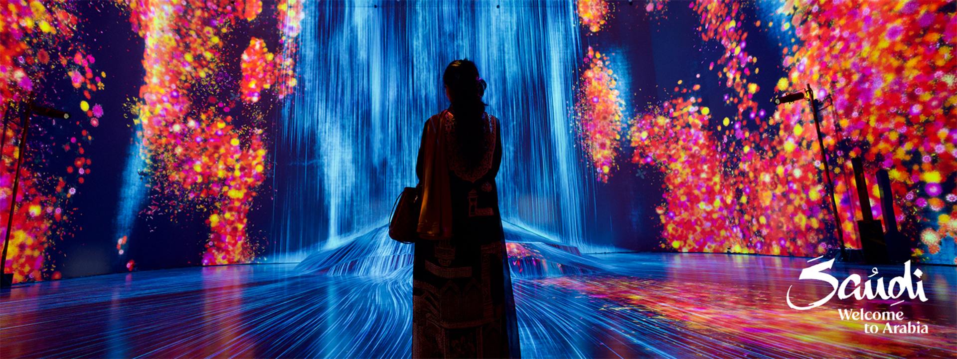 Saudi woman watching a stunning light show