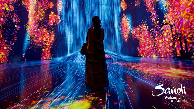 Saudi woman watching a stunning light show